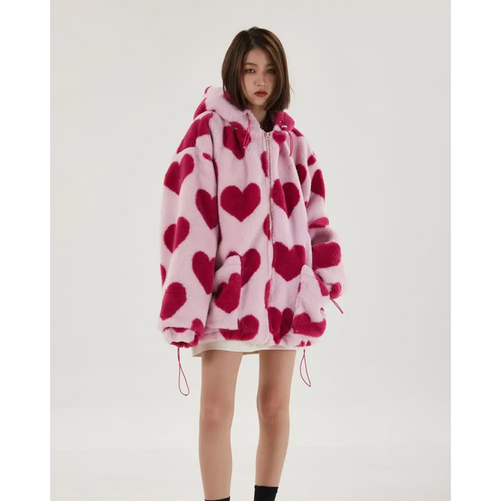 Pink hooded jacket with heart pattern and adjustable drawstring hood