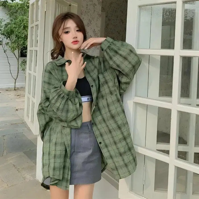 Grunge y2k style plaid shirt with puff sleeves and button fastening