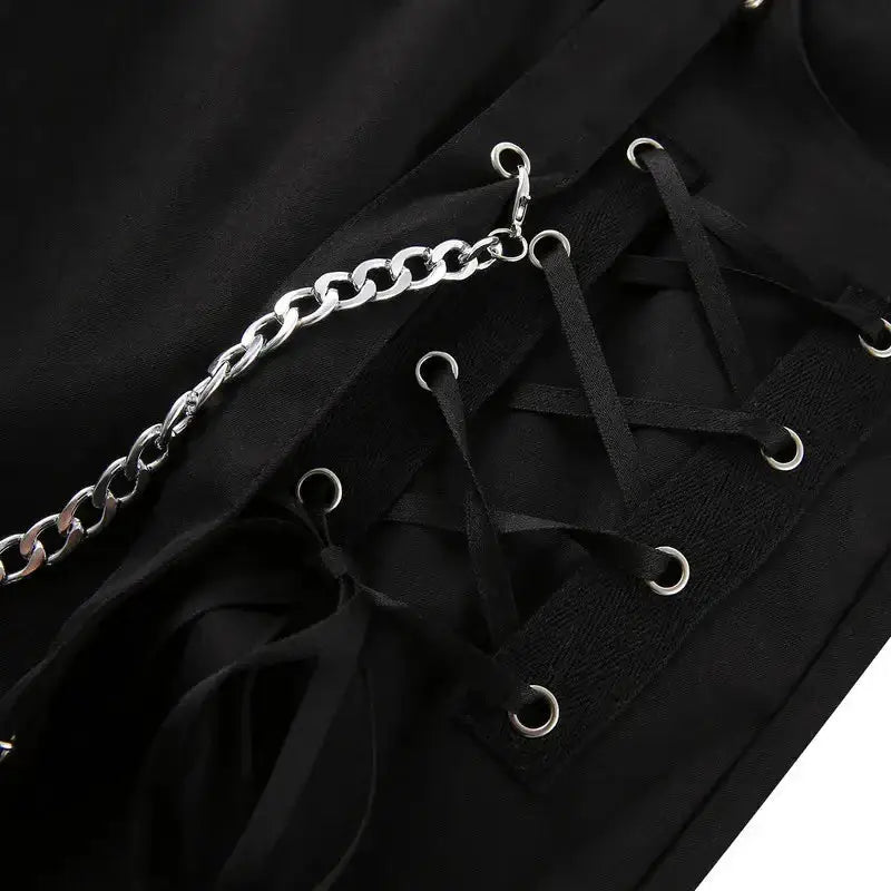 Punk low-waist black pants with tie-up sides and chains