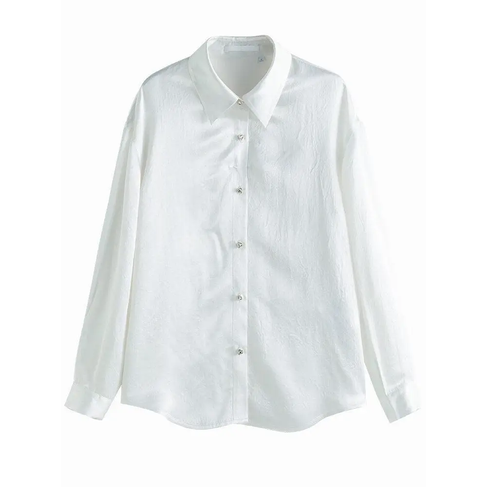 White satin blouse with classic collar and pure design