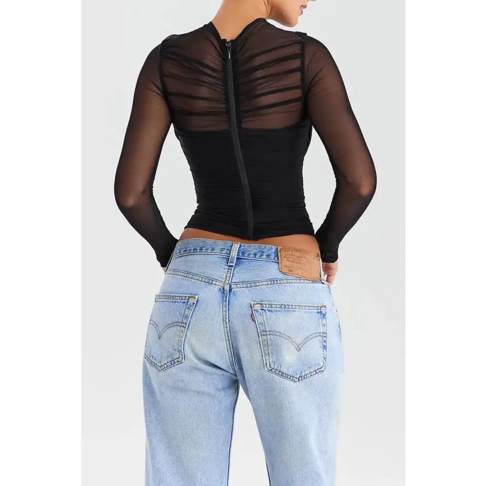 Chic sheer mesh top with lined cross neck and zip fastening