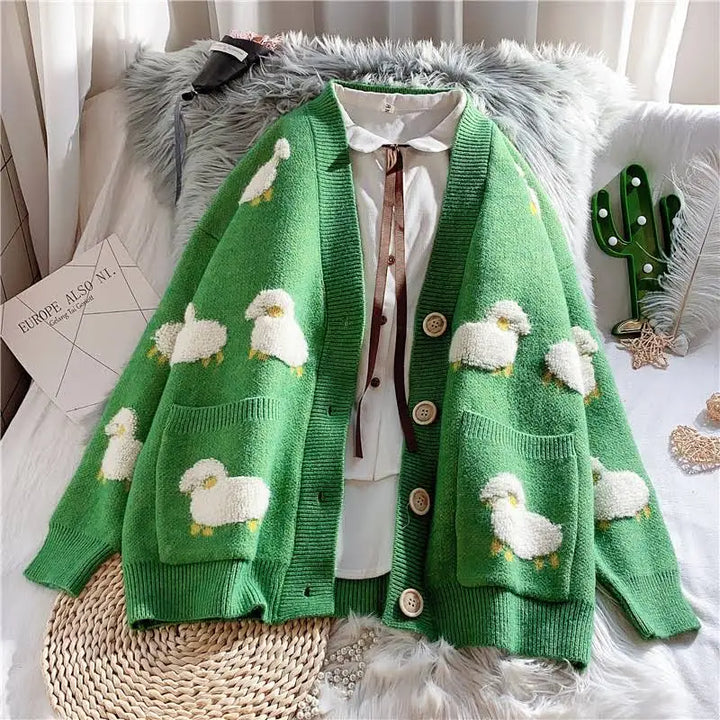 Stylish knitted cardigan with unique sheep embroidery design - green / l