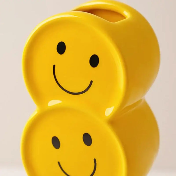 Smiley face emoji vase for quirky room decor and cheerful plants