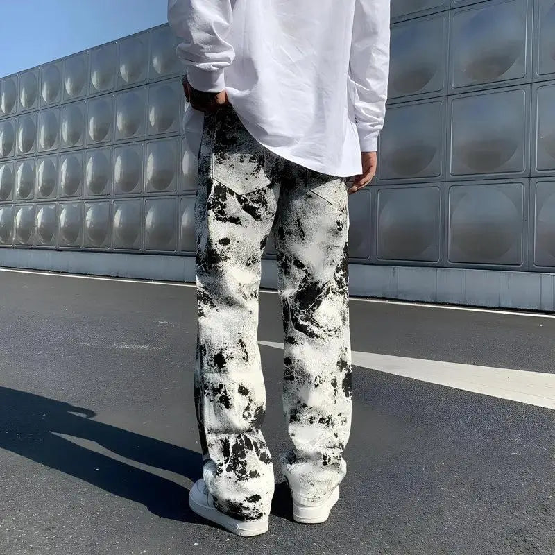 Y2k straight leg jeans in spray paint-inspired denim material