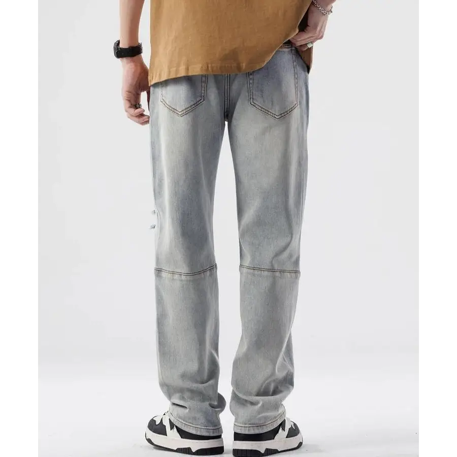 Straight leg distressed knee jeans