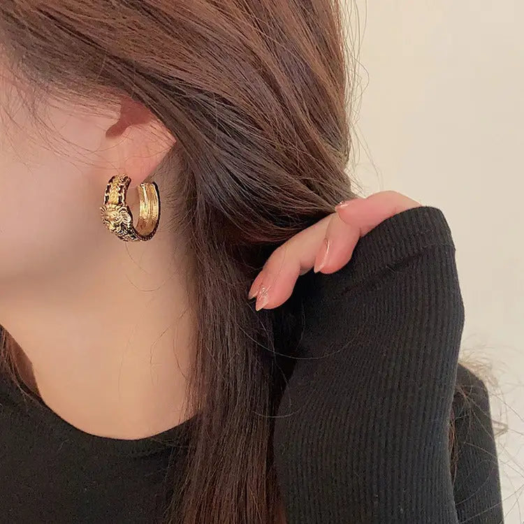 Vintage-inspired lion hoop earrings for a chic look - standart / gold - earrings